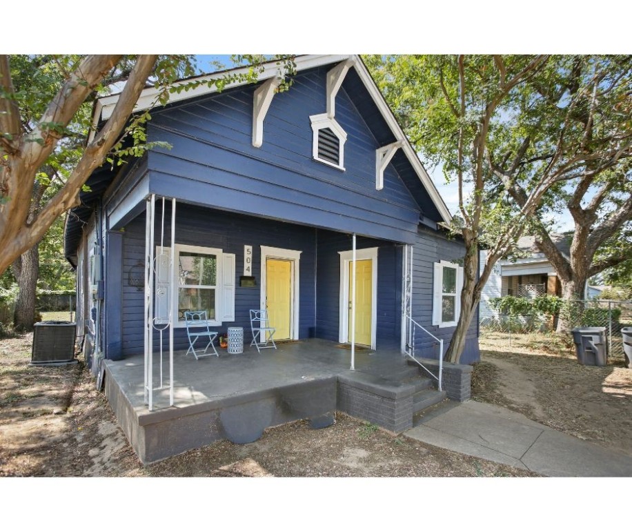 a view front of house with outdoor seating