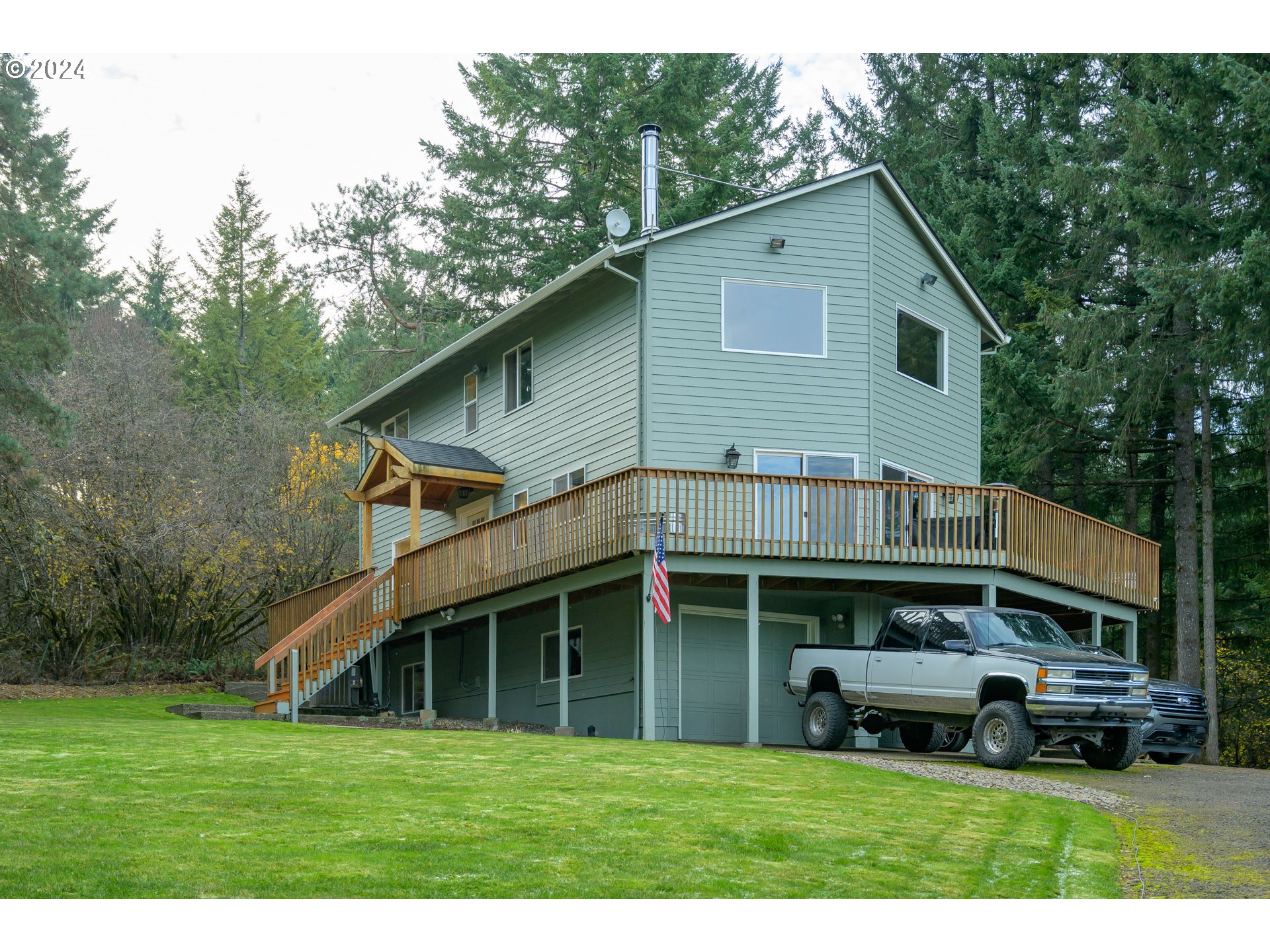 a view of house with yard