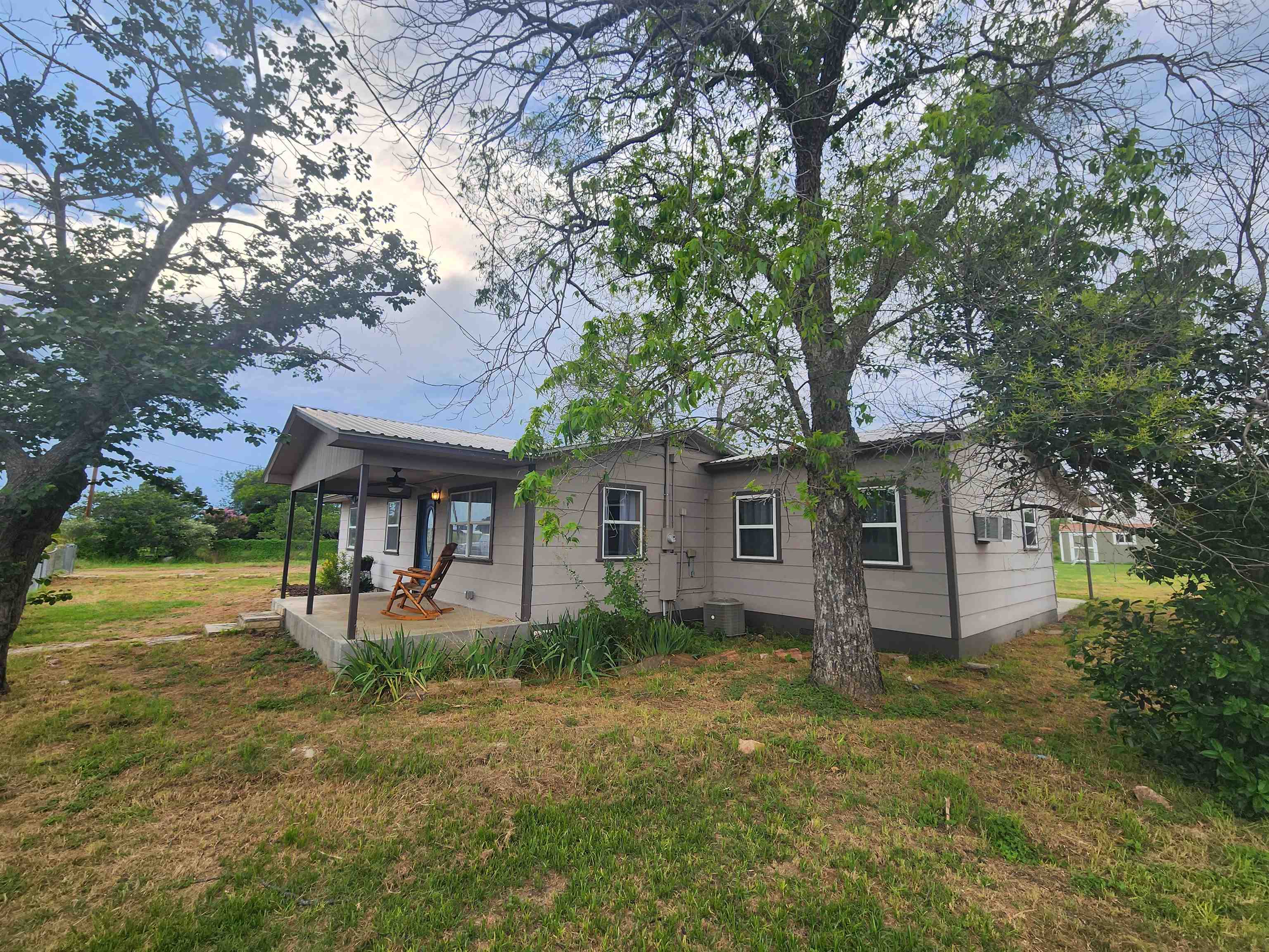 front view of house with a yard