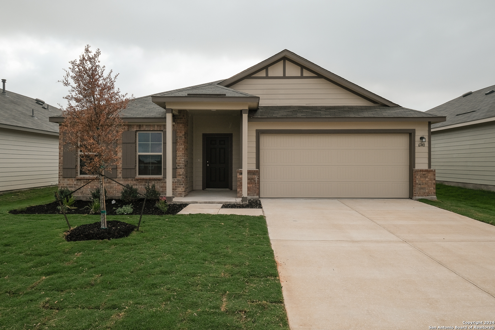 a front view of house with a yard