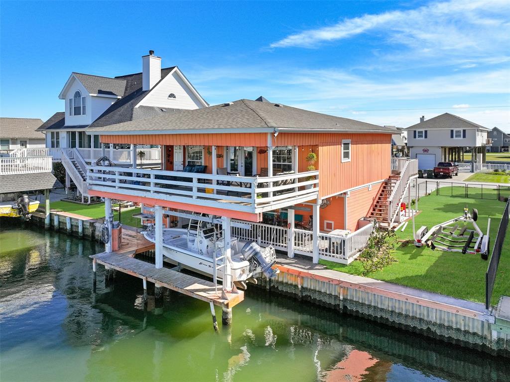 a aerial view of a house with swimming pool