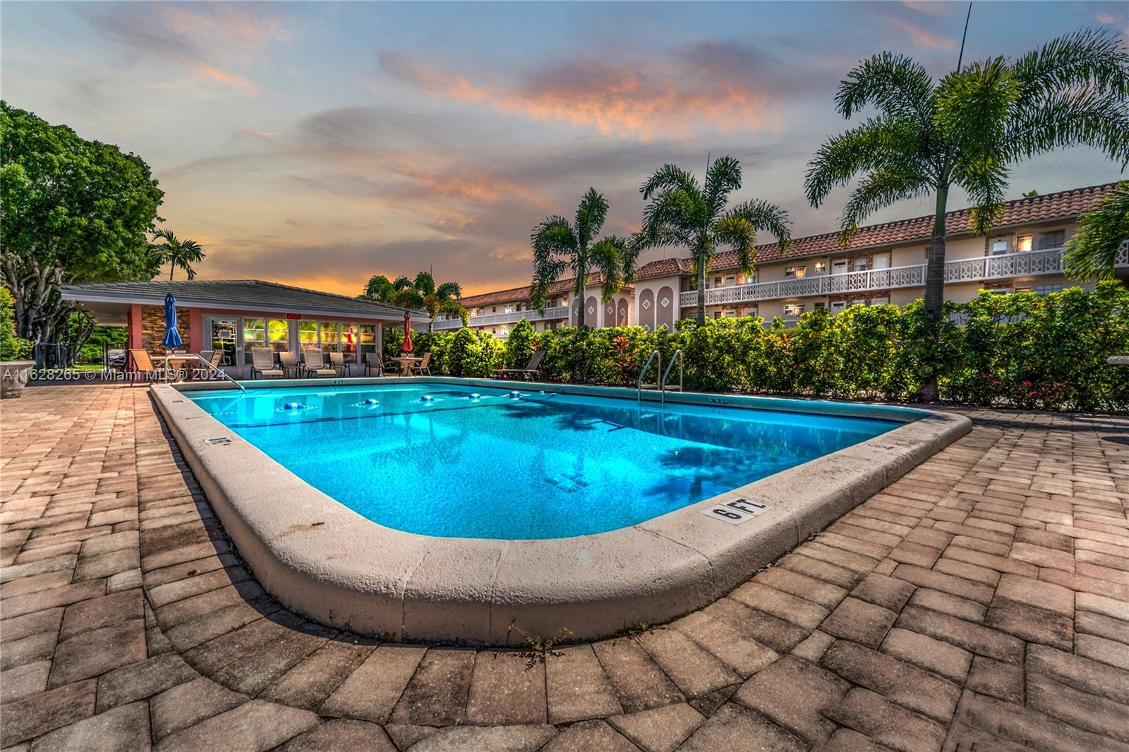 a view of outdoor space swimming pool and lake view