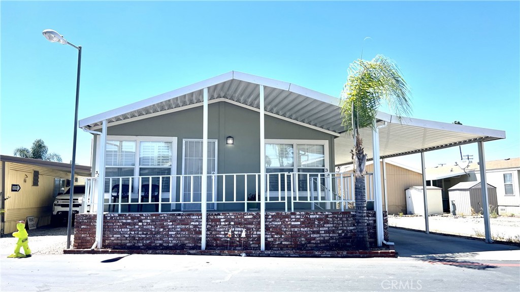 a view of an house with a porch