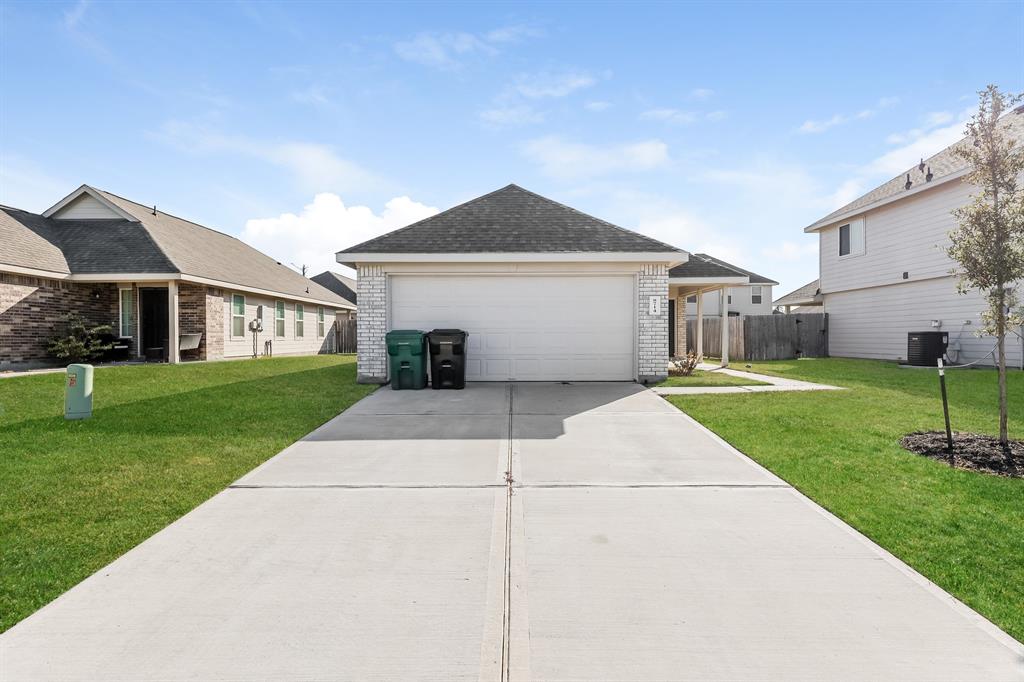 a front view of a house with yard