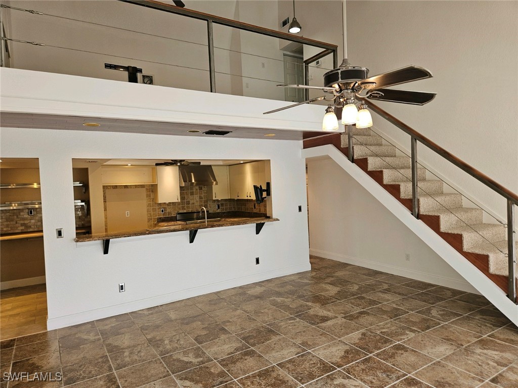 a view of a livingroom with wooden floor