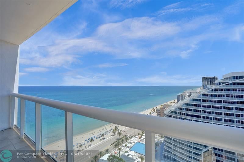 a view of balcony with ocean view