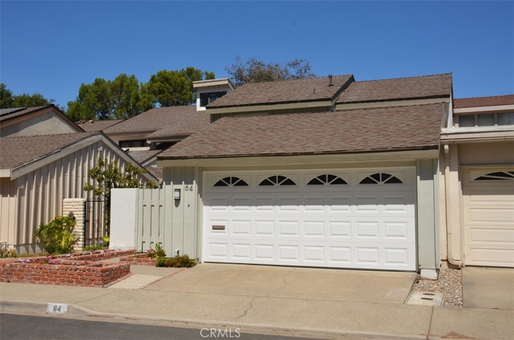 a view of a house with a garage