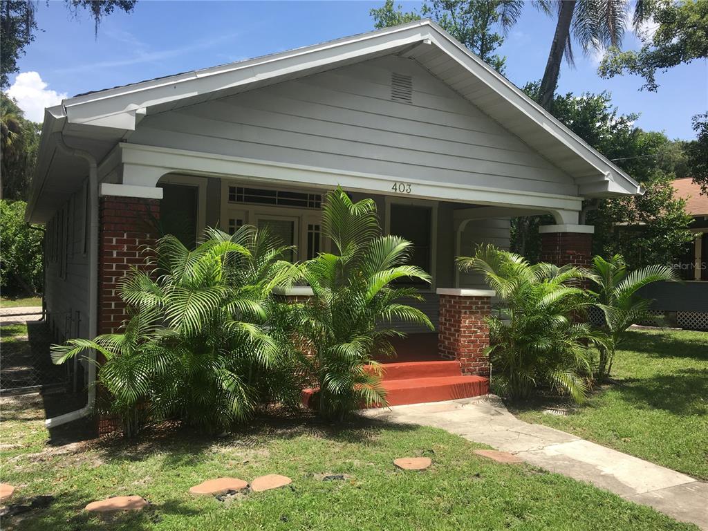 a front view of house with yard