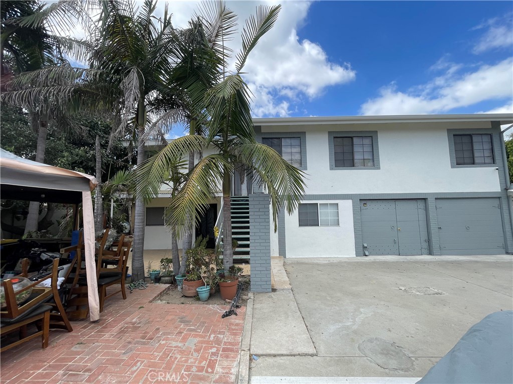 a view of a house with a patio