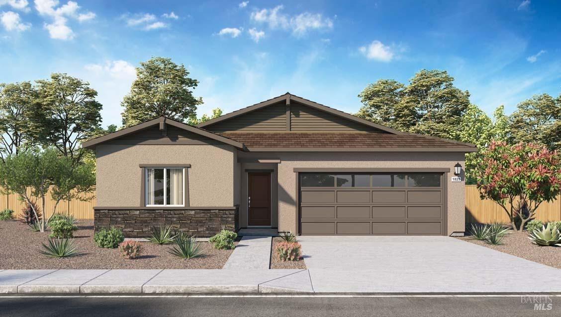 a front view of a house with garage