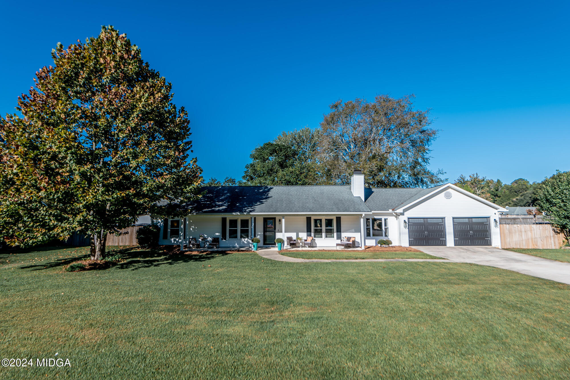 a house view with a garden space