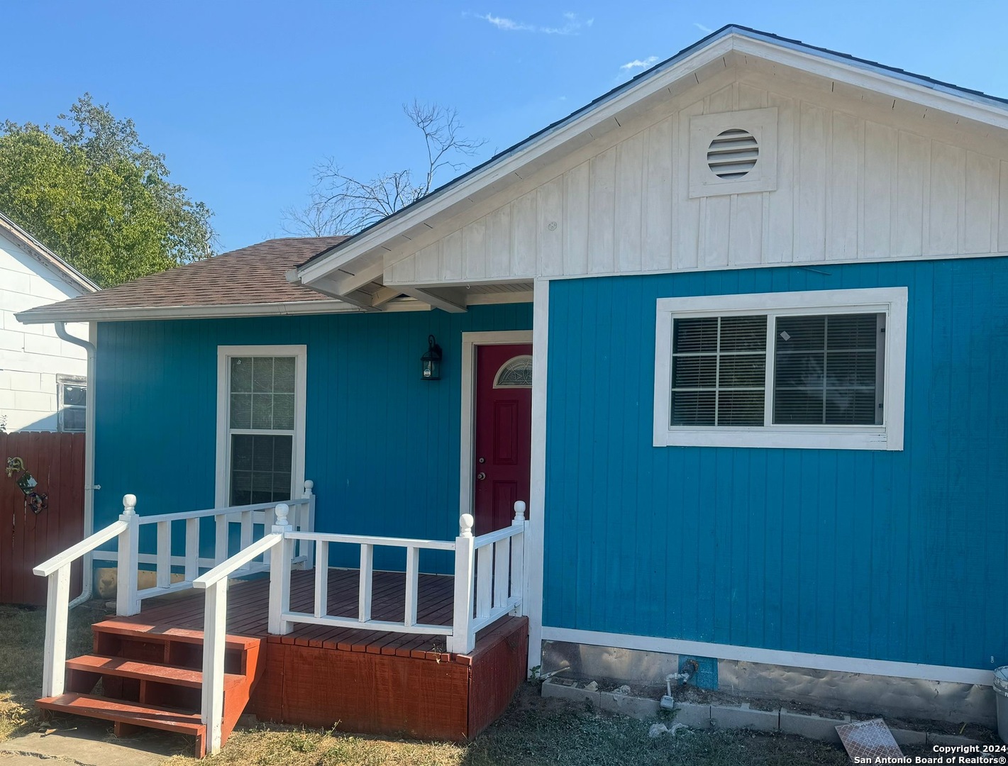 a view of house with front door