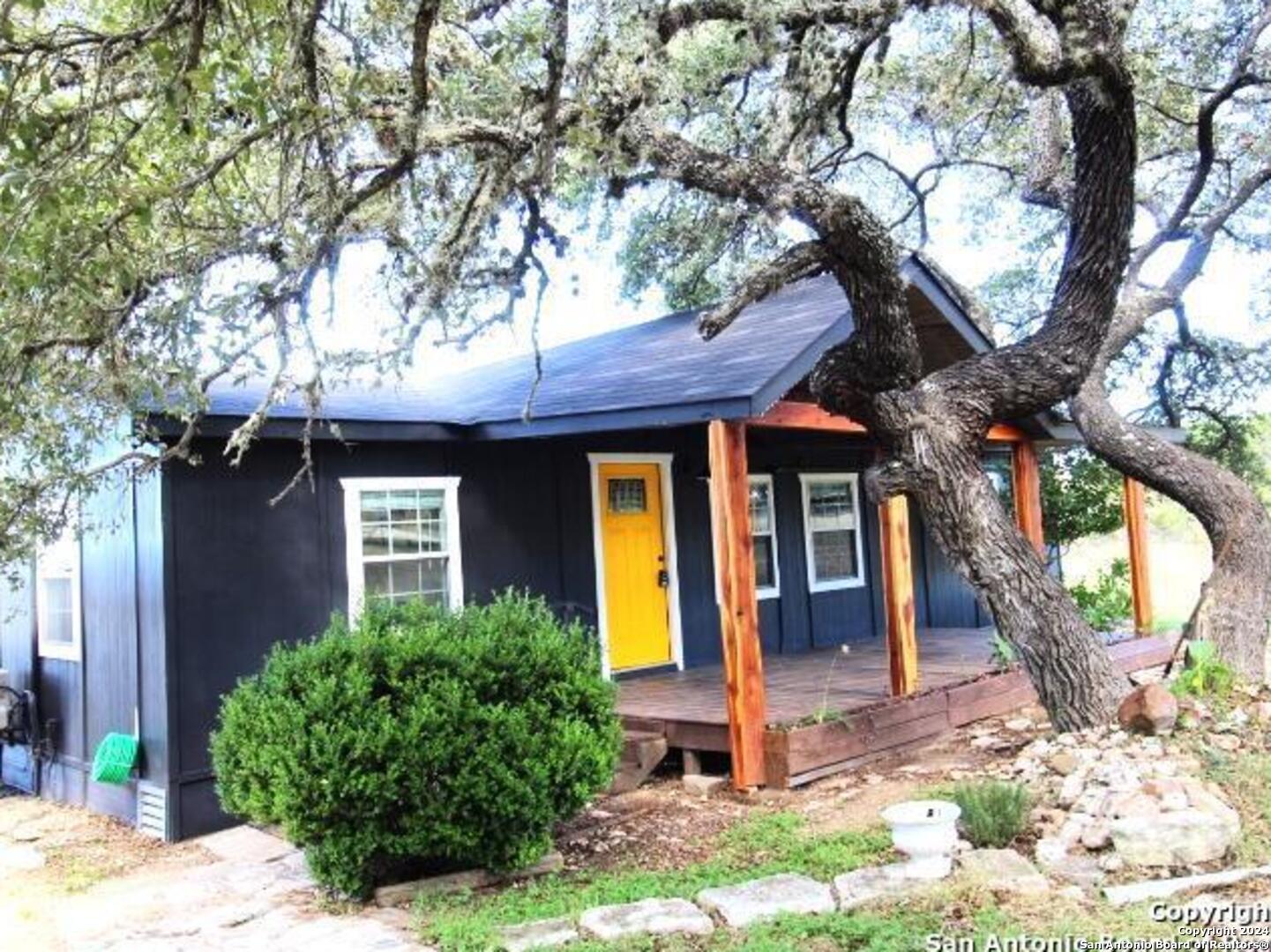 a front view of a house with a porch