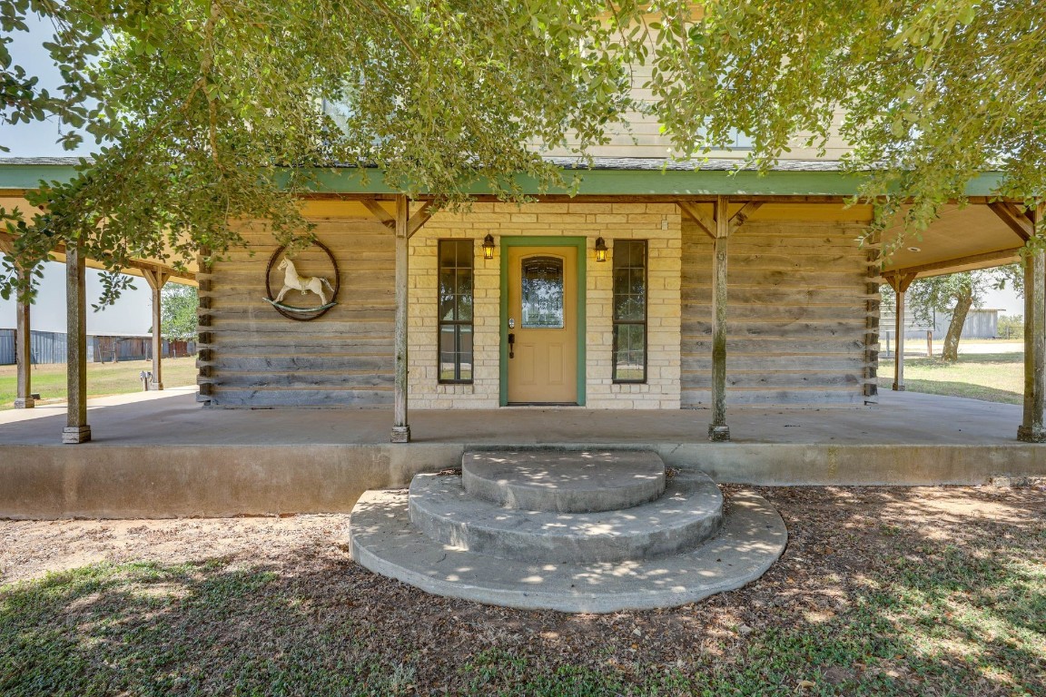 a view of a house with a small yard