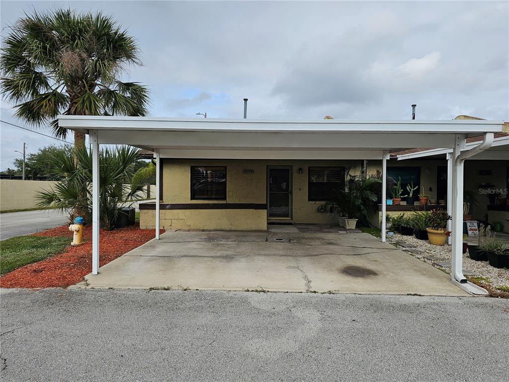 a view of a house with a patio