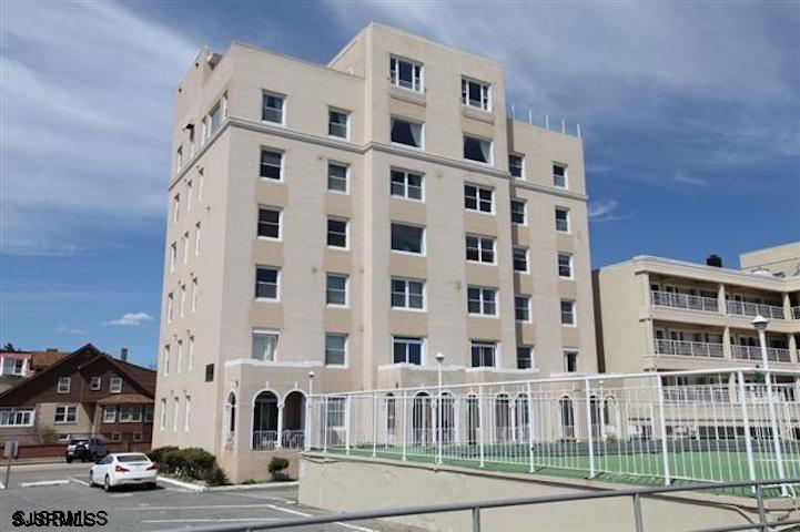 a view of a building with a street