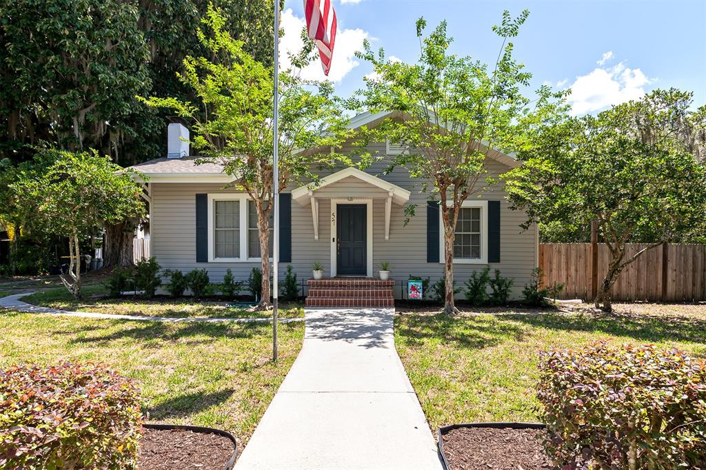 a front view of a house with swimming pool