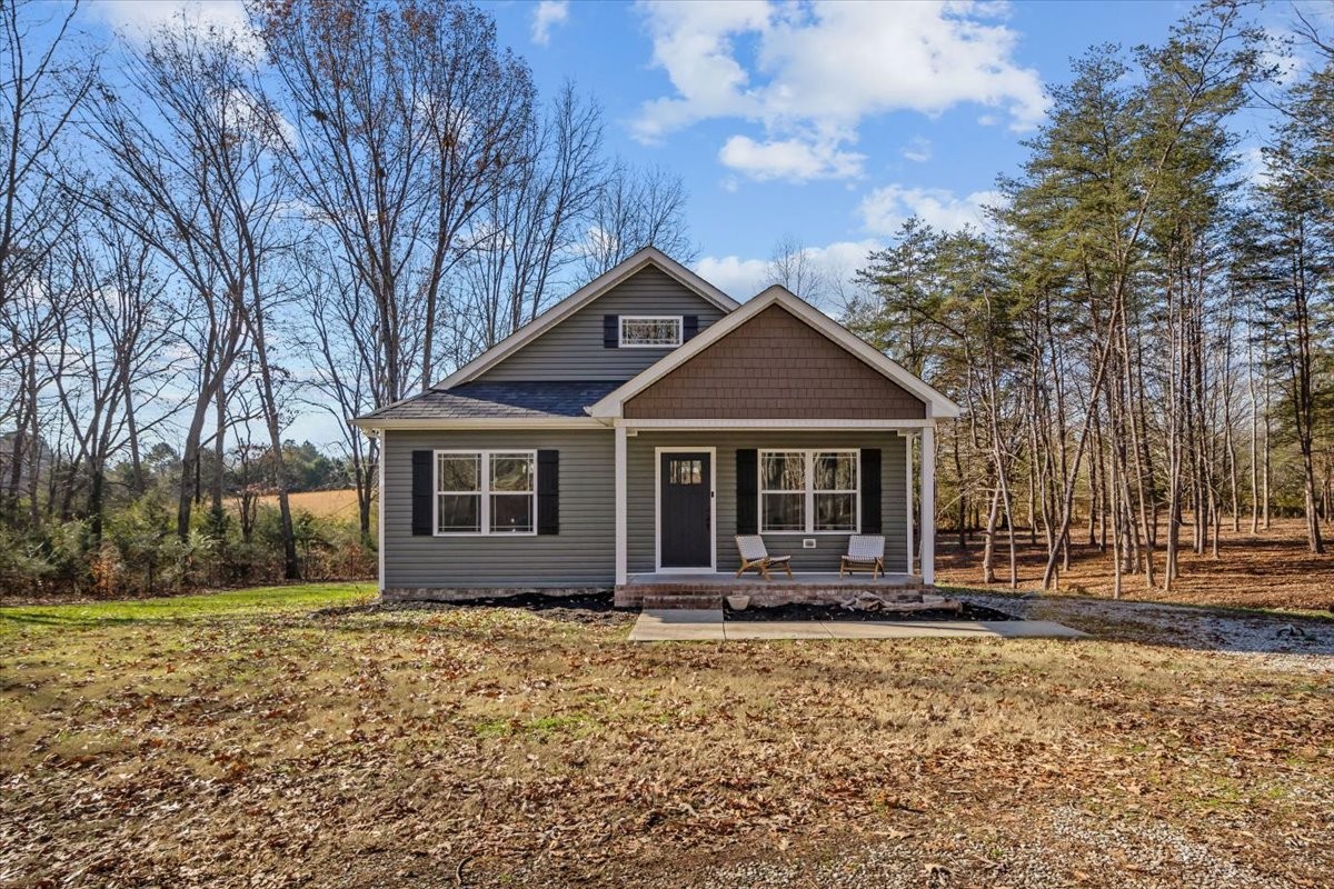 front view of a house with a yard