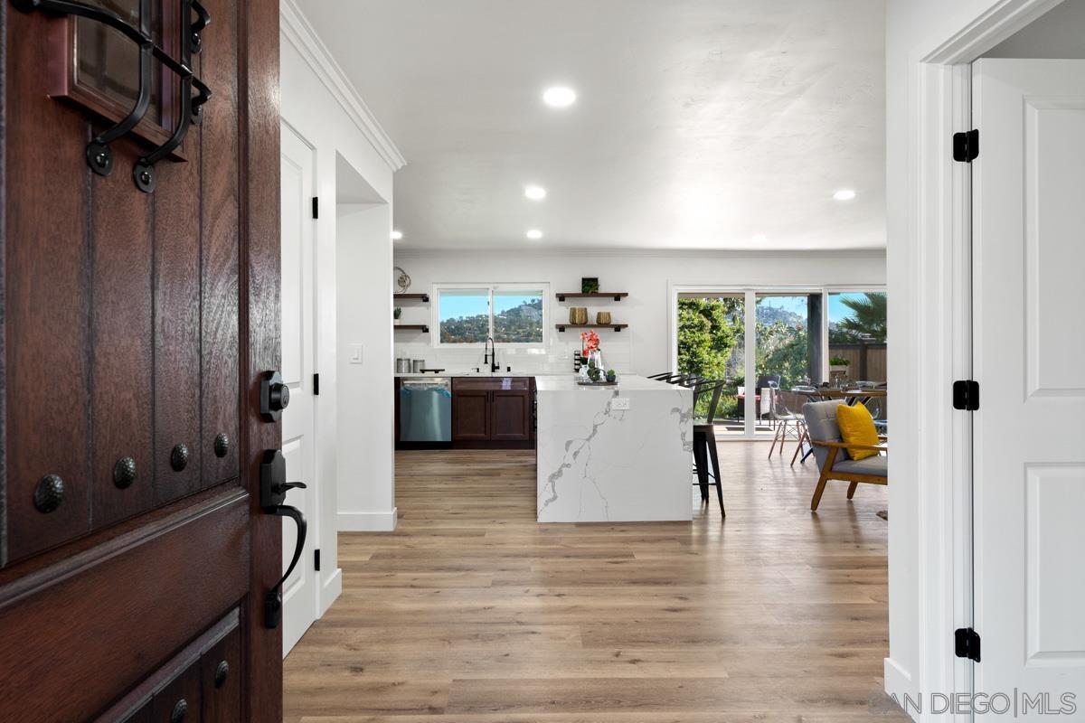 a view of a living room and hardwood floor