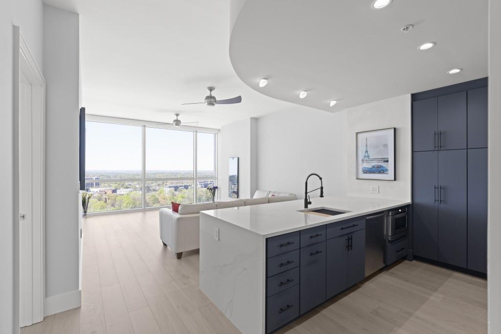 a kitchen with sink and window