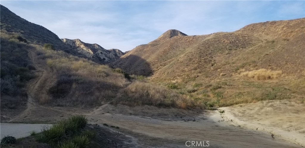 a view of mountain view with mountains in the background