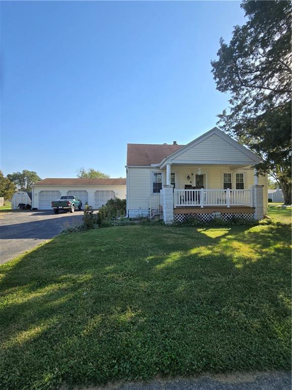 a view of a house with a big yard