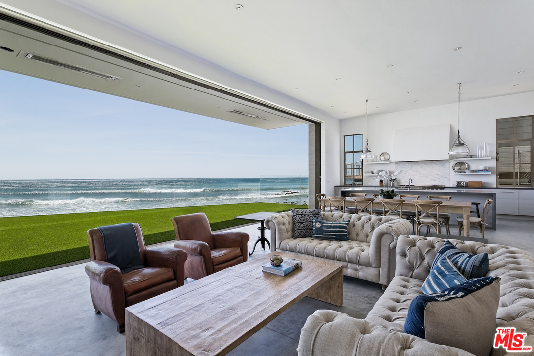 a living room with furniture and a view of living room