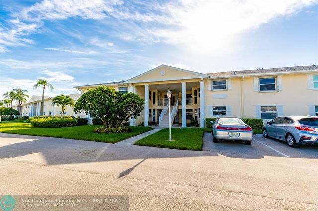 $220,000 | 500 Grove Isle Circle, Unit 202 | Grove Isle Condominiums