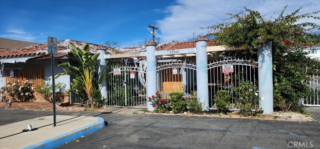 a front view of a building with street view