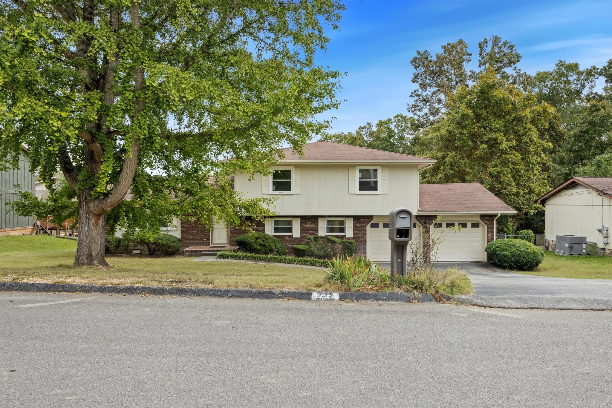 front view of a house with a street