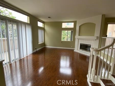 Living Room with High Ceilings, Sliding Doors to the front Patio