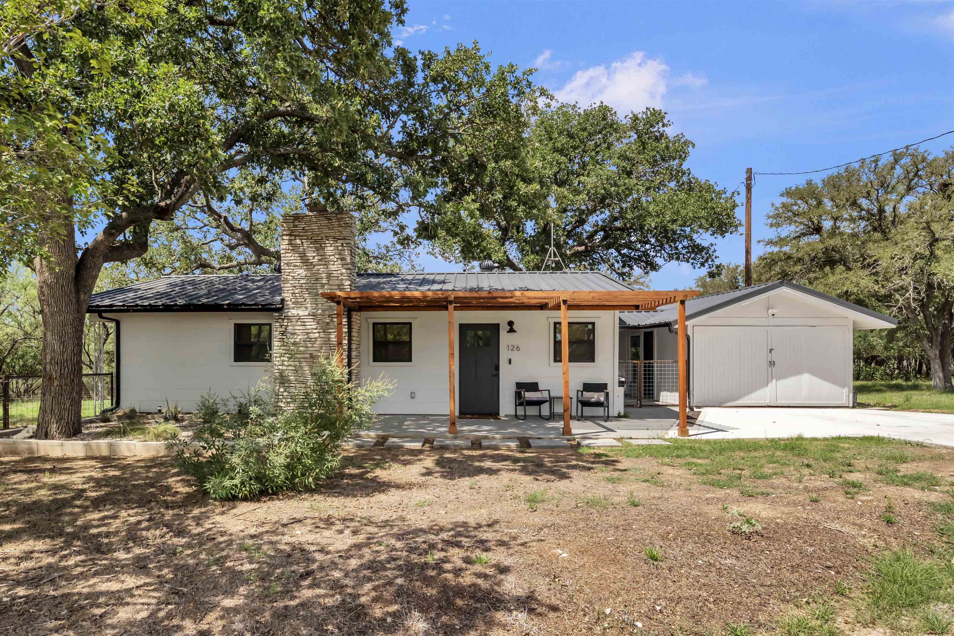 front view of a house with a yard