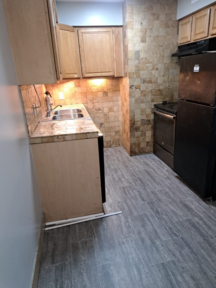 a utility room with washer and dryer