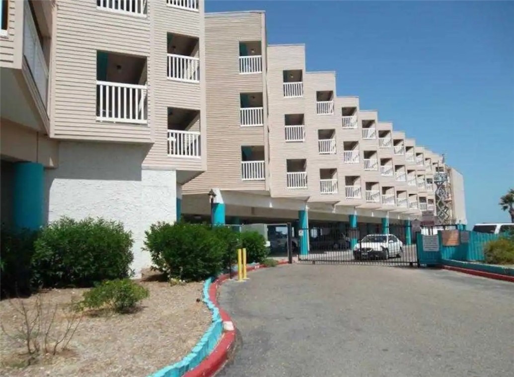 a view of a building with a street