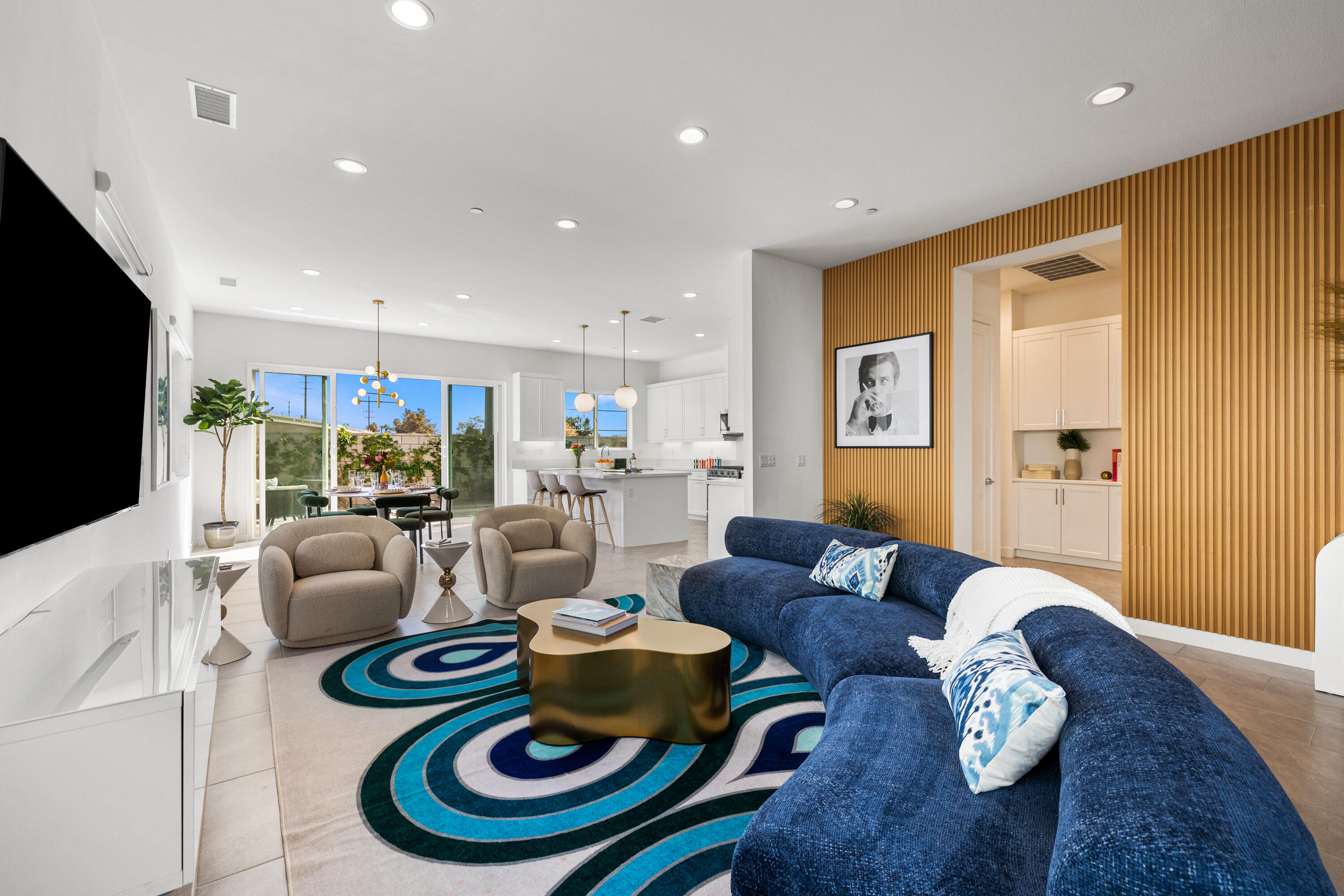 a living room with furniture and a flat screen tv