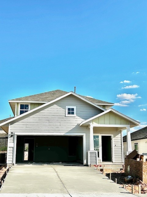 a front view of a house with a garage