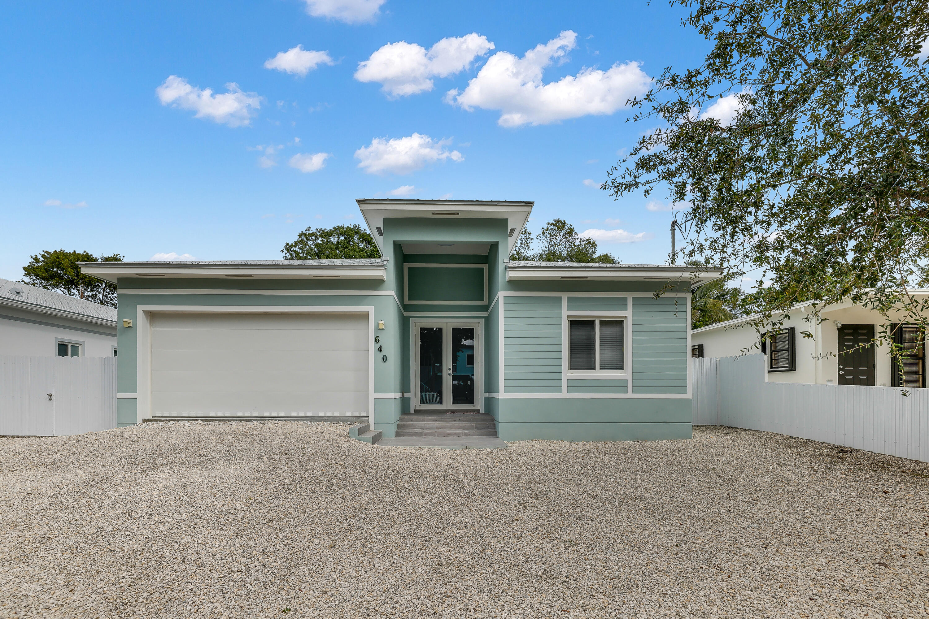 front view of a house with a garage