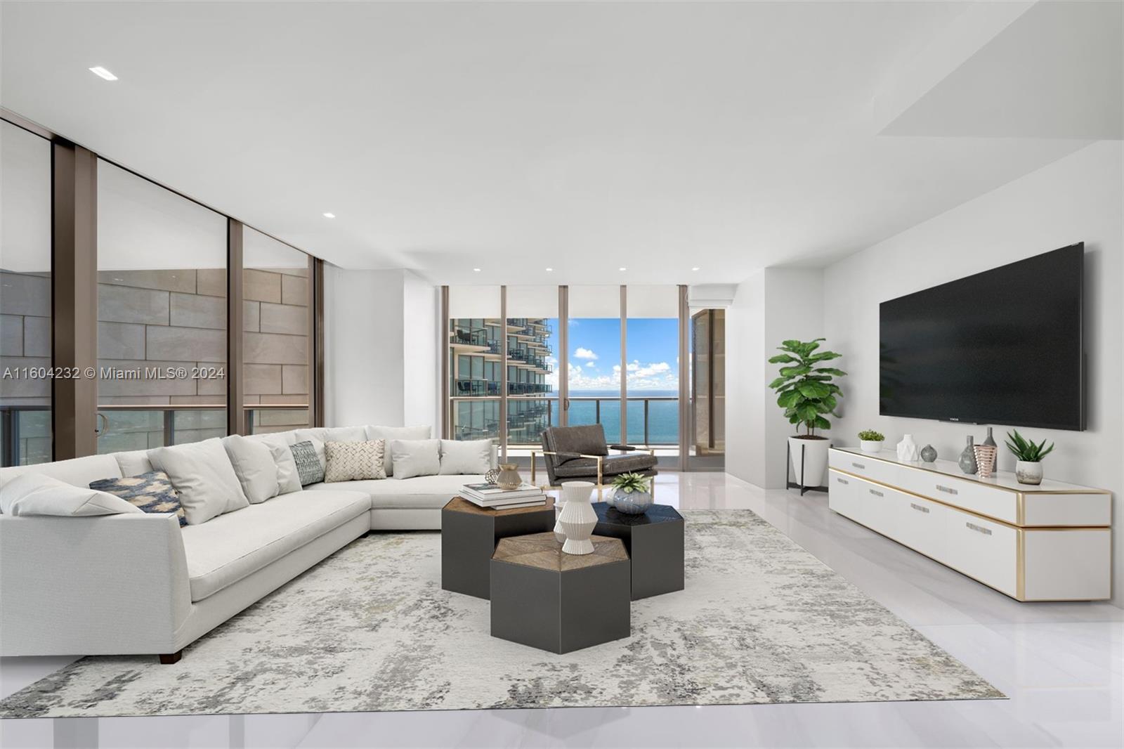 a living room with furniture and a flat screen tv