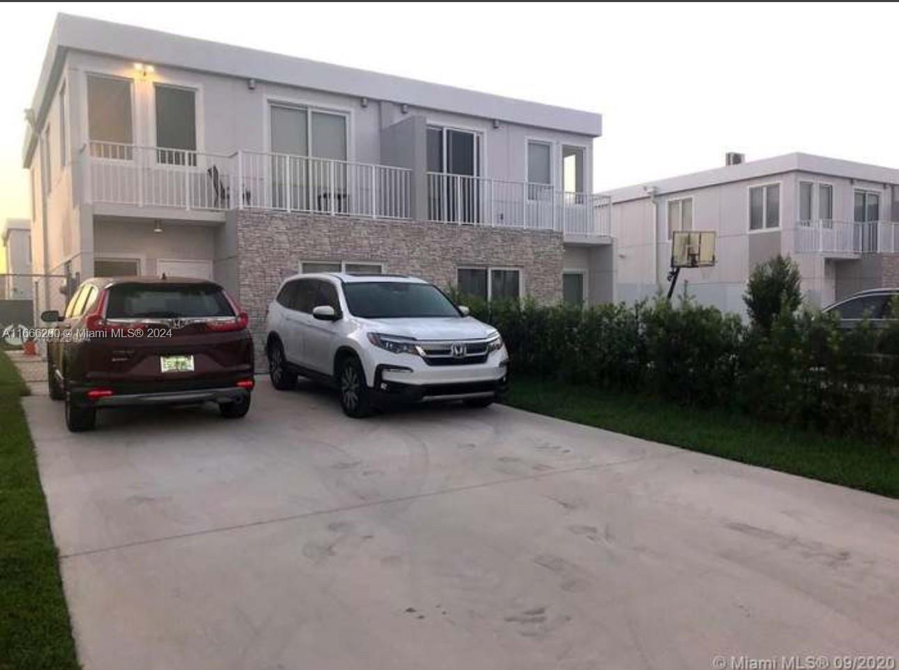 a car parked in front of a building