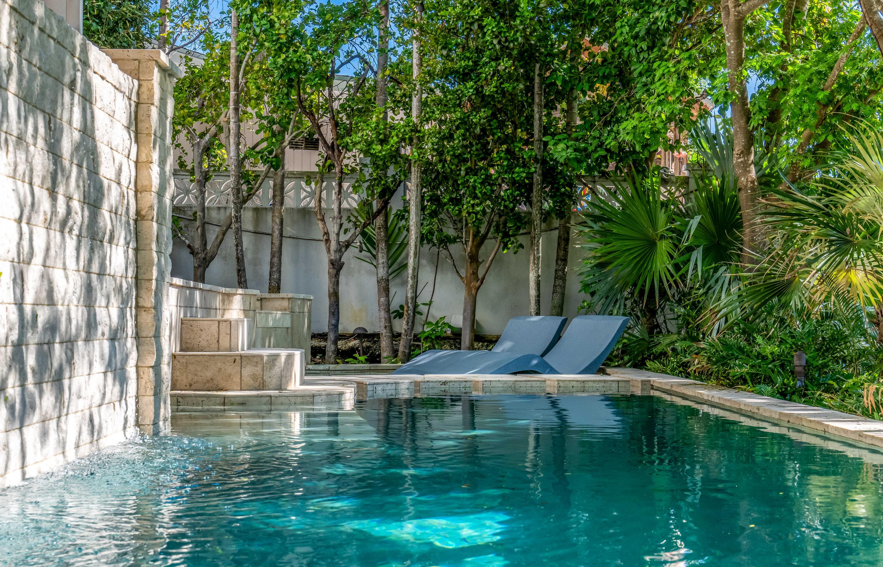 a view of swimming pool with a yard