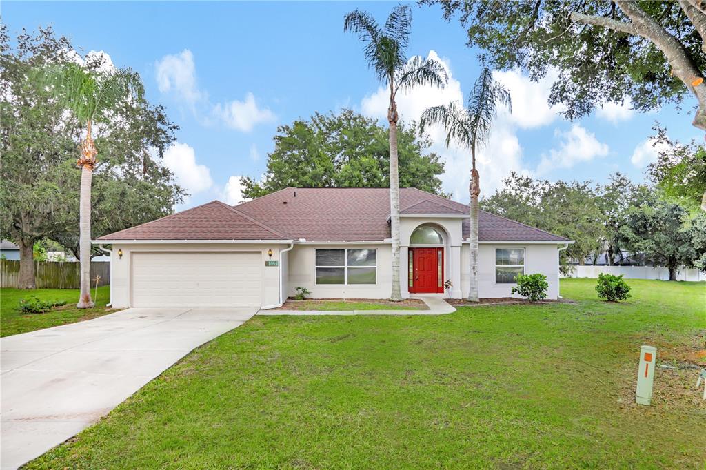 front view of a house with a yard