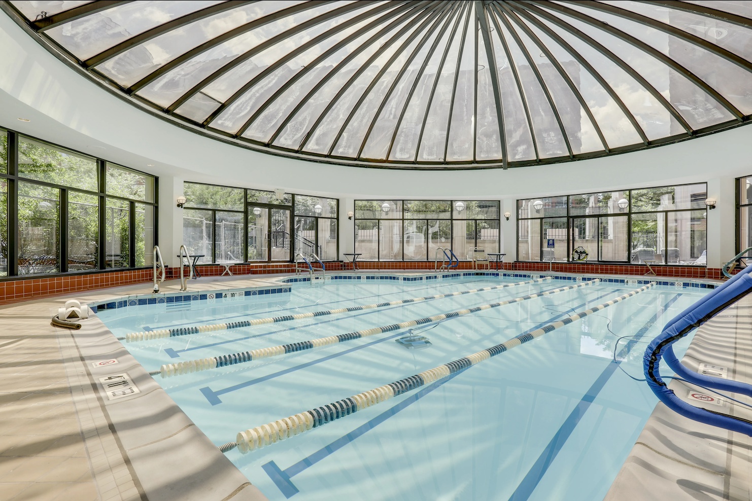 a view of swimming pool with outdoor seating