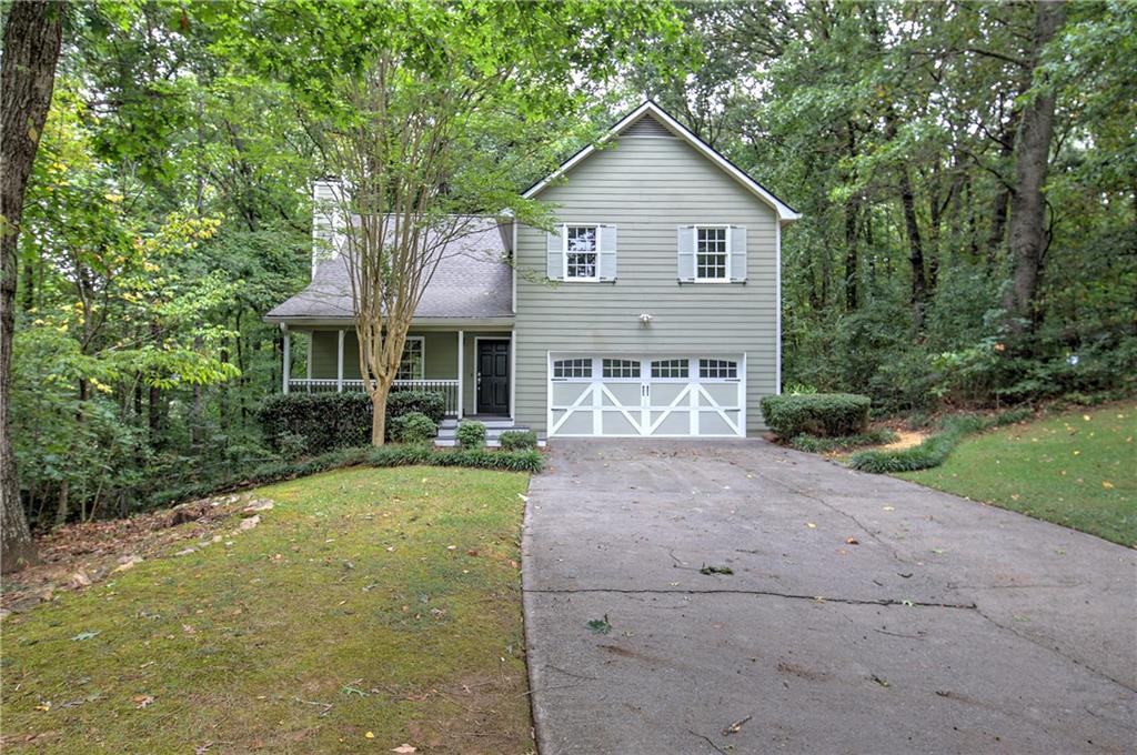 a view of a yard in front of house