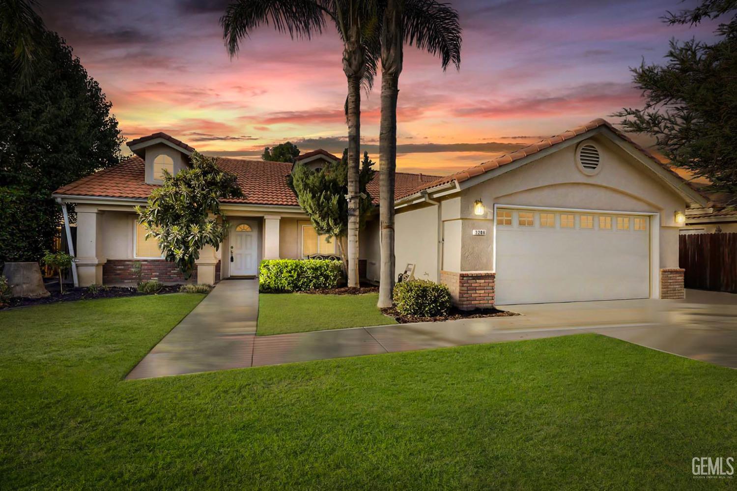 front view of a house with a yard