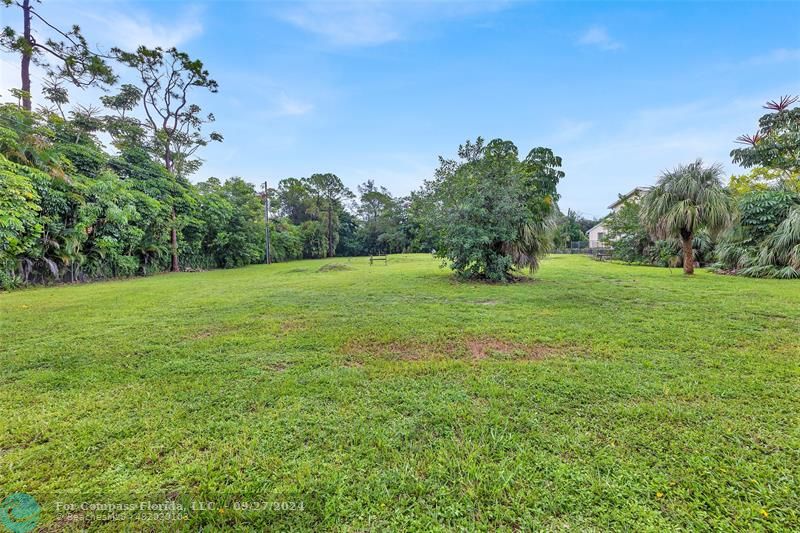 RARE almost an acre (0.94) of residential land with 138 foot frontage on Lyons road  in the Coconut Creek area