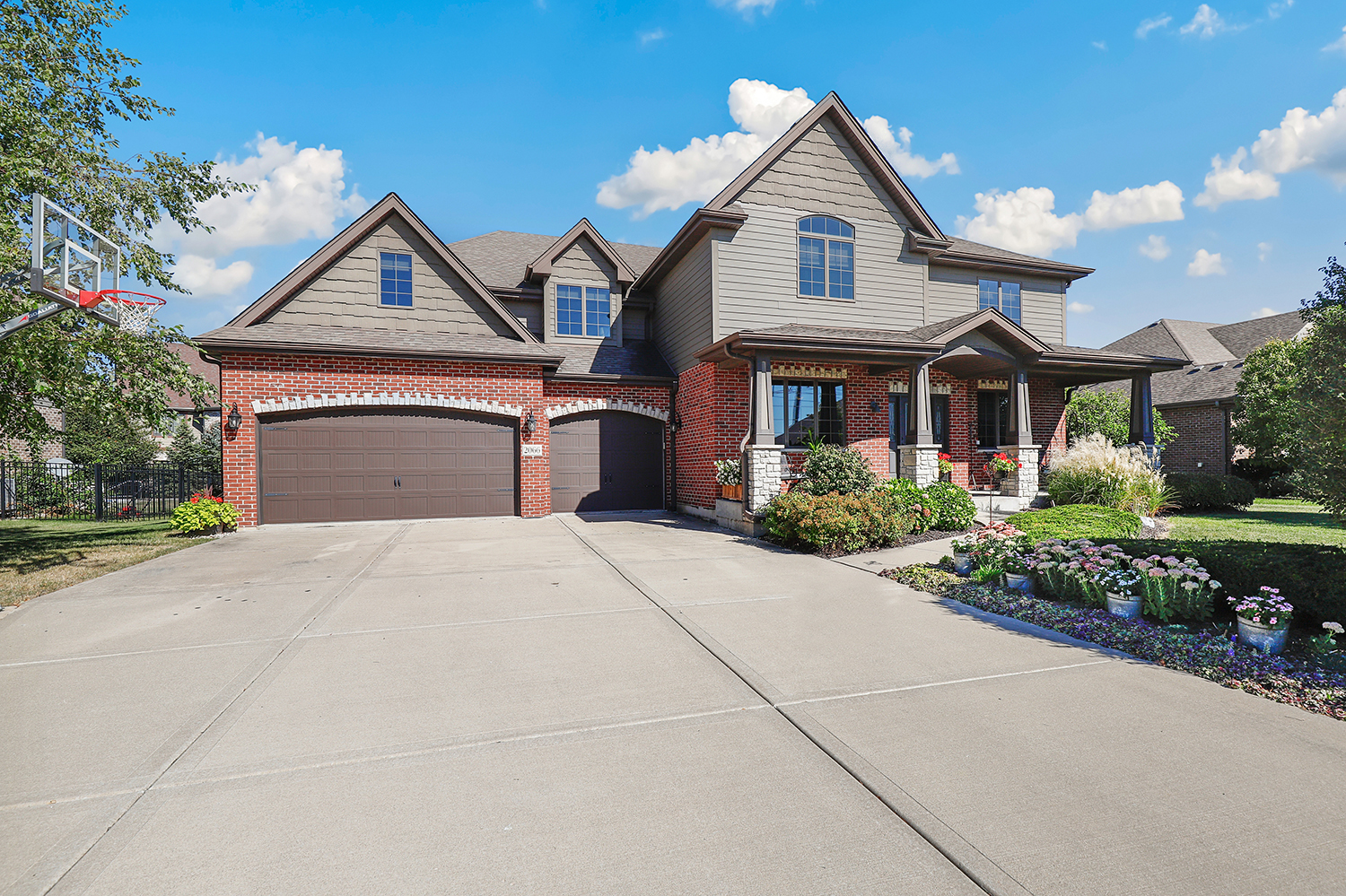 front view of a house with a yard