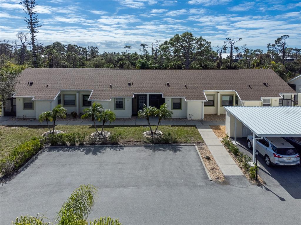 an aerial view of a house with a garden