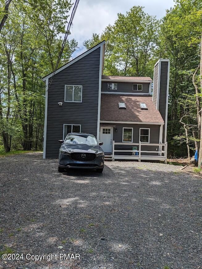 a car parked in front of a house