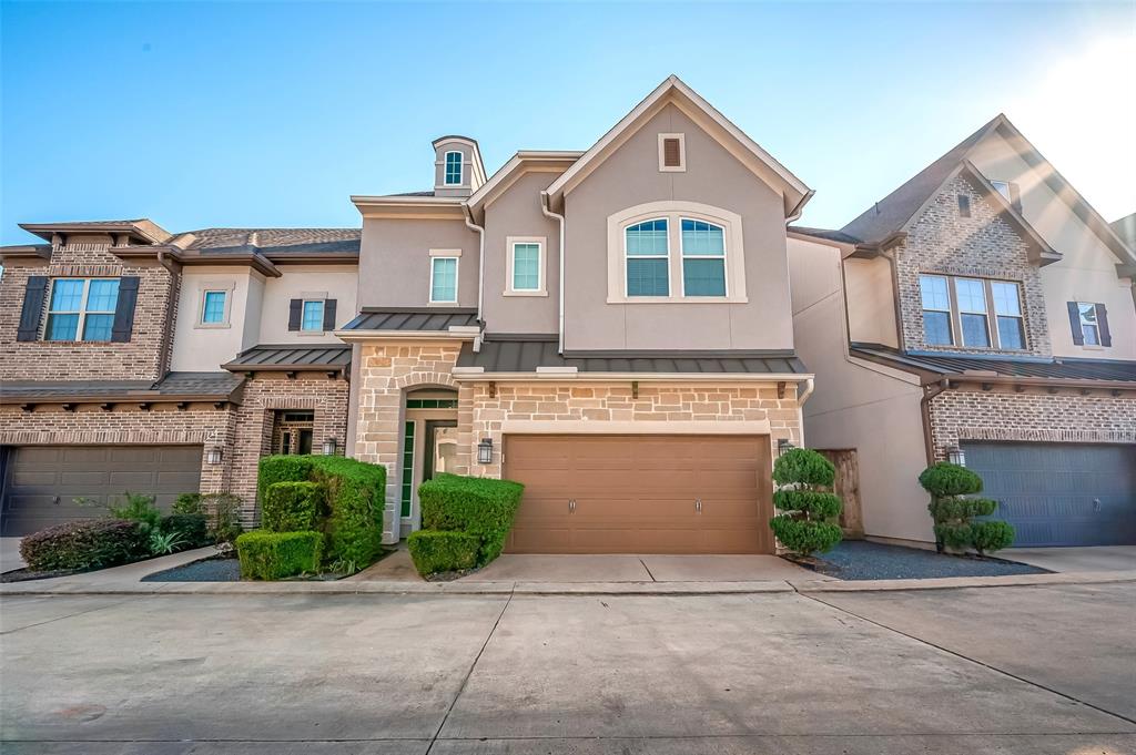 Wow!  Beautiful David Weekley built 2 story contemporary in highly desirable GATED Royal Oaks Square