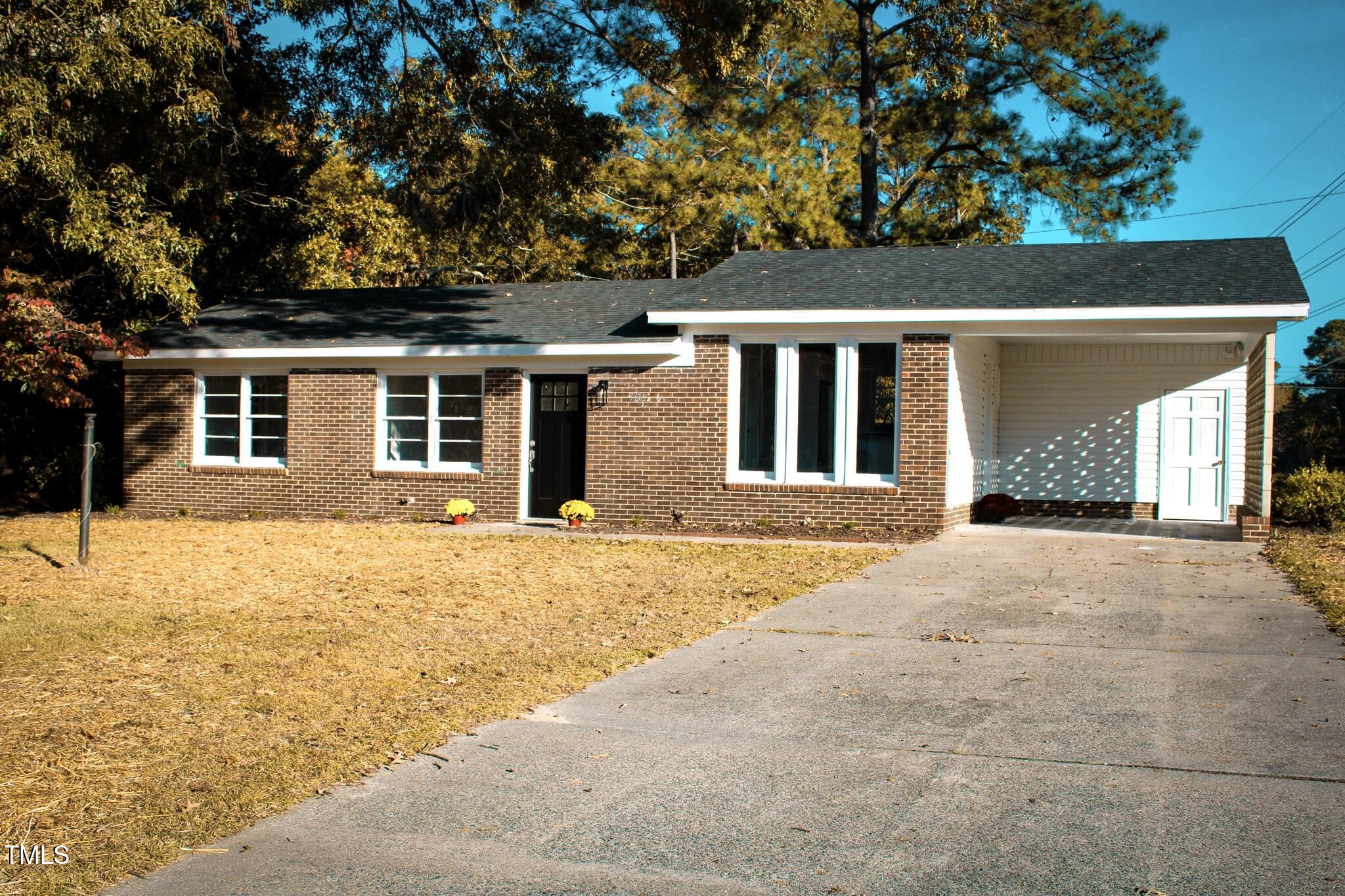 front view of a house with a outdoor space